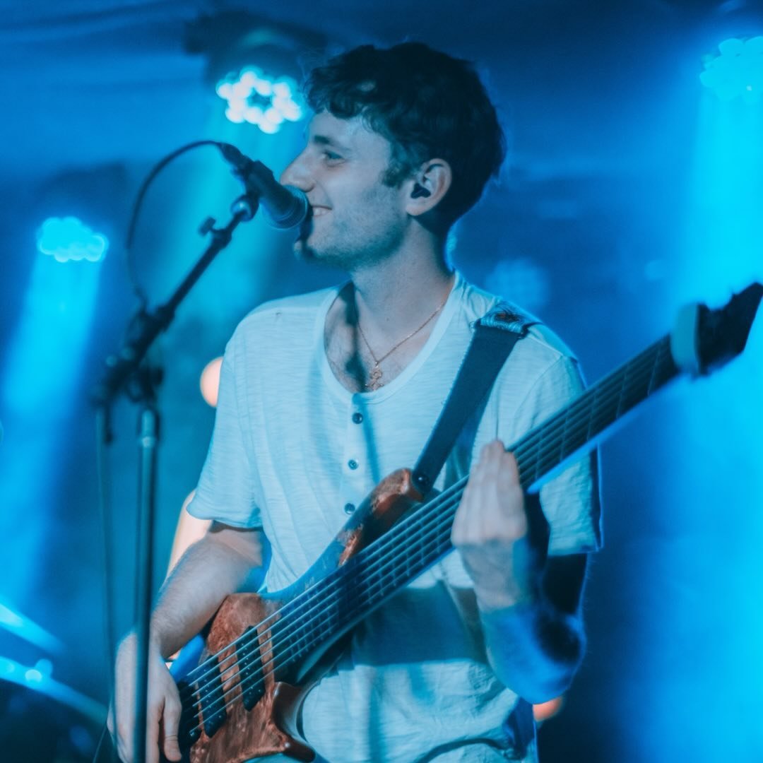 Jordan on bass live blue light